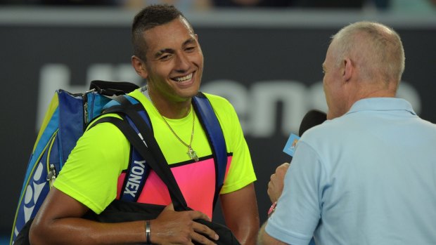 Nick Kyrgios is interviewed on court after his victory.