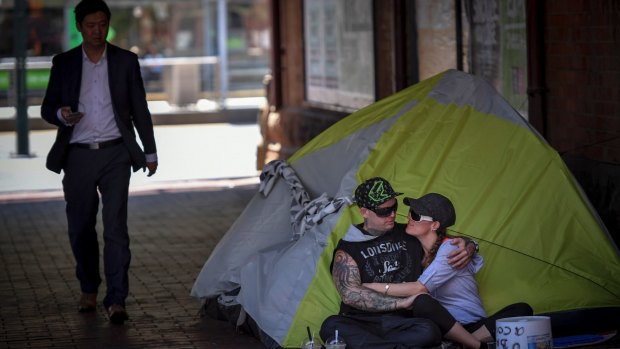 Homeless couple Josh and Tara are camping out near the corner of Flinders and Market Street.