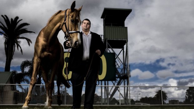 Fairytale without a happy ending: Nathan Tinkler in his brief glory days with one of his mares at the Randwick Race course.