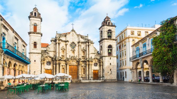 The large Cathedral of Havana in Cuba sits in an empty square.