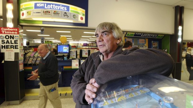 Garry Prince, owner of the newsXpress newsagency and lotto outlet at Kippax Fair shopping centre, has concerns about Woolworths petrol outlets selling lotto tickets and scratchies.
