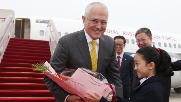 Smooth operator: Prime Minister Malcolm Turnbull arrives in Shanghai.