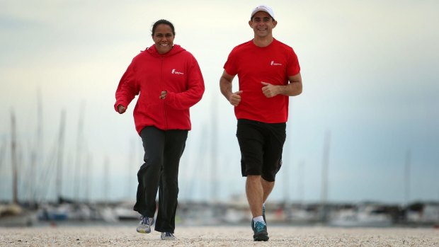 Olympic gold medallist Cathy Freeman with indigenous businessman Dwayne Good, who will run for Team Freeman in the City2Surf.