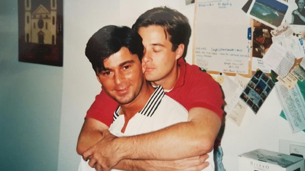 Jones (in red shirt) lost his boyfriend Stephen to AIDS-related illness.