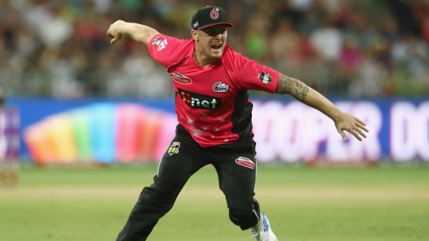 Screamer: Jason Roy of the Sixers celebrates taking he catch to dismiss Ben Rohrer of the Thunder at Spotless Stadium on Tuesday.