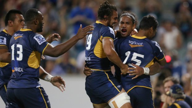The Brumbies celebrate Joseph Tomane's try against the NSW Waratahs.