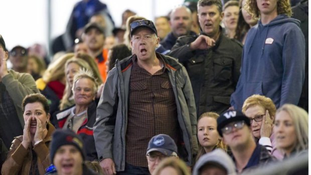 The crowd react after referee Niklas Gaal was struck by a player.