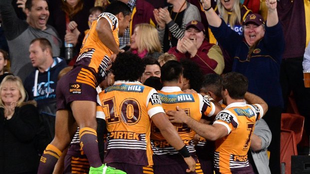 Roosters roasted: The Broncos celebrate during their win over the Roosters.