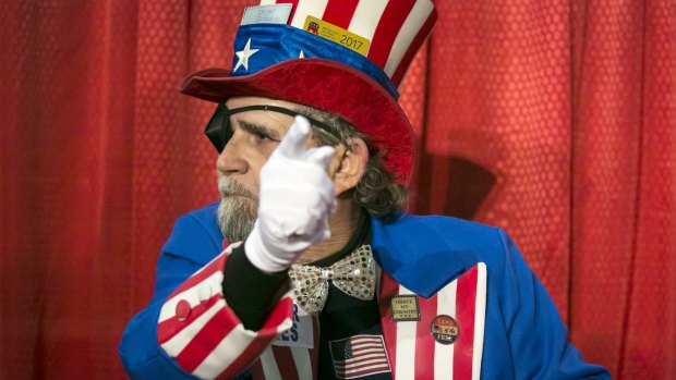An man in an Uncle Sam costume during a campaign rally with Donald Trump in Pensacola, Florida, on Friday.