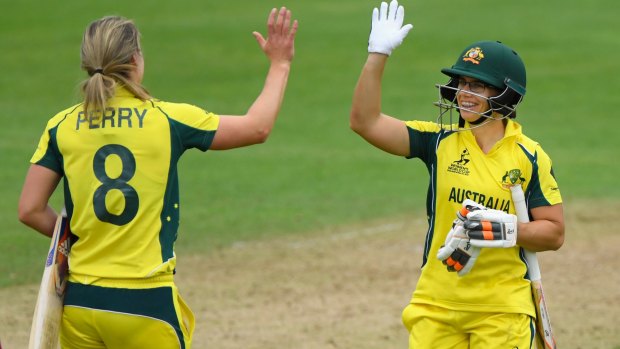 TAUNTON, ENGLAND - JUNE 26: Australia batsman Nicole Bolton (r) and Ellyse Perry celebrate victory during the ICC Women's World Cup 2017 match between Australia and West Indies at The Cooper Associates County Ground on June 26, 2017 in Taunton, England. (Photo by Stu Forster/Getty Images)