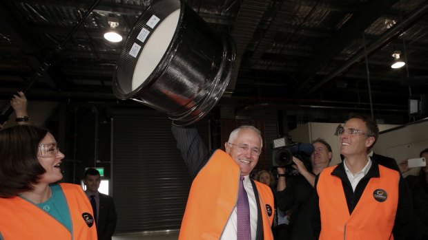 Prime Minister Malcolm Turnbull lifted a 7.3kg carbon fibre wheel during a visit to Carbon Revolution in Geelong on Tuesday.