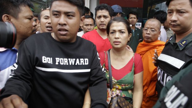 Bou Rachana arrives at the scene where her husband was shot dead in Phnom Penh.