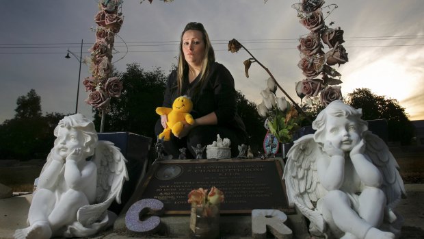 Renee Jones at Charlotte Rose Keen's grave in Wodonga in 2009.