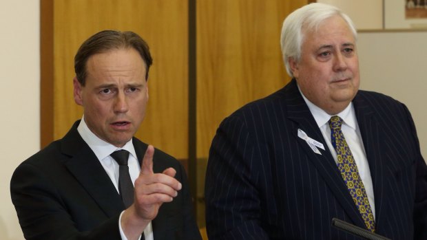 Greg Hunt and Clive Palmer in 2014, when their deal led to the climate change review.