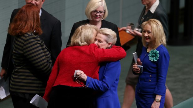 Bronwyn Bishop is embraced by colleagues after the vote to replace her.