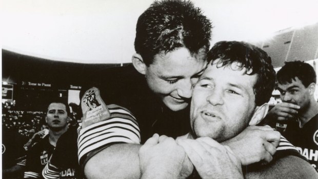 Royce Simmons and Mark Geyer celebrate their 1991 grand final victory.