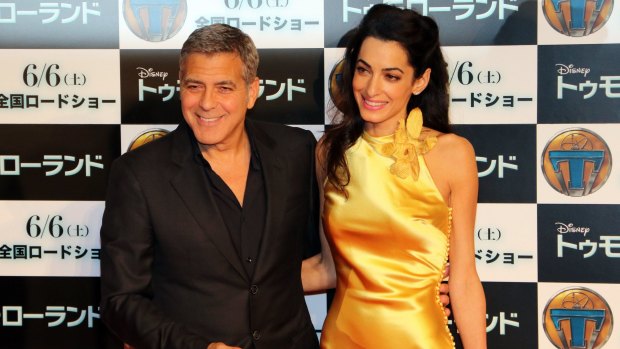 Glamour couple: George Clooney and his wife Amal  at the Tokyo premiere of <i>Tomorrowland</i> on Monday. 