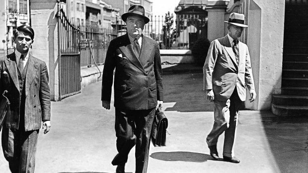 Robert Menzies arriving at a federal cabinet meeting held at Parliament House in Sydney,  1941.