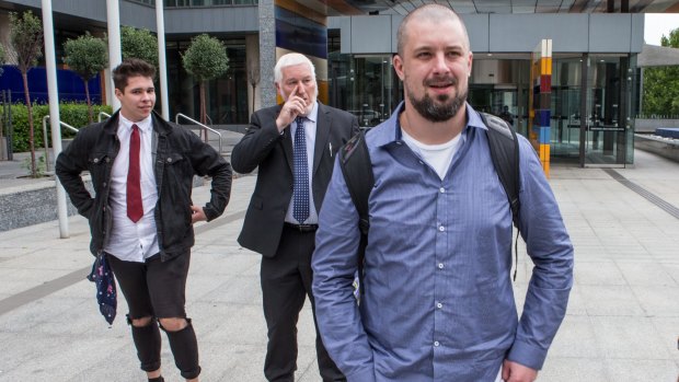 Right-wing activist Neil Erikson (right) outside court on Monday. 