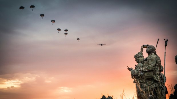 Paratroopers from the US 173rd Airborne Brigade during a night jump, as part of an exercise last July called Sabre Guardian at Bezmer Airbase in Bulgaria.