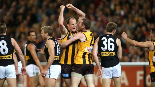 Jarryd Roughead celebrates with David Hale during last year's preliminary final win against Port Adelaide.