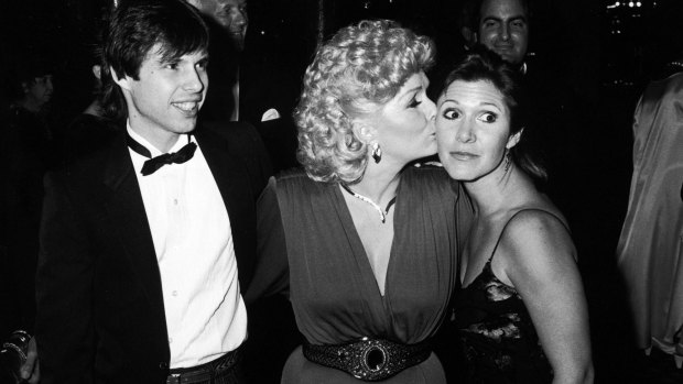 Debbie Reynolds (centre) with children Todd and Carrie Fisher.