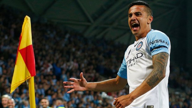 Tim Cahill  celebrates after kicking a goal during the FFA Cup final.