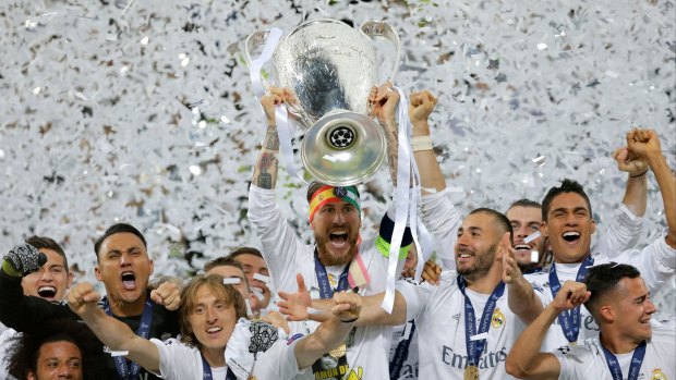 Trophy time: Real Madrid's Sergio Ramos celebrates after the Champions League final win over Atletico Madrid at the San Siro stadium in Milan, Italy.