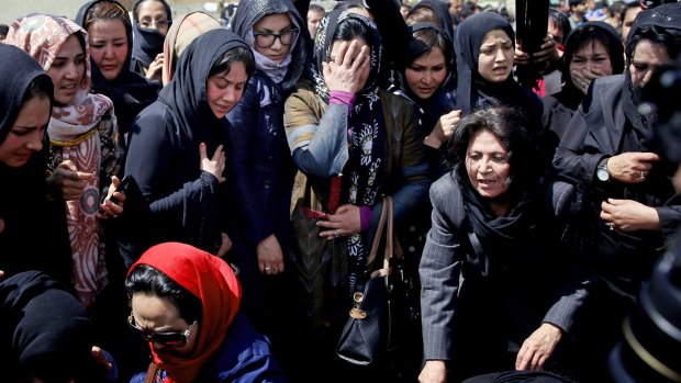 Women mourn during the funeral of 27-year-old Farkhunda.
