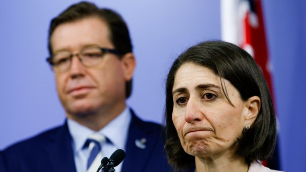 Searching for a path forward on council amalgamations: NSW Premier Gladys Berejiklian and Police Minister Troy Grant.