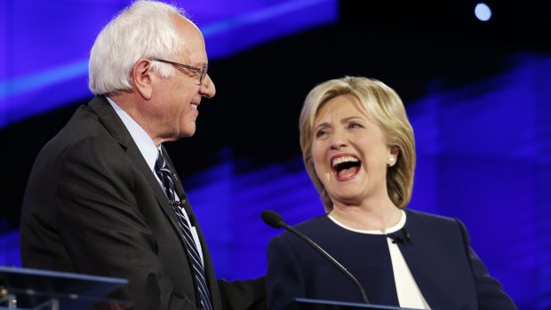 Senator Bernie Sanders, of Vermont and Hillary Rodham Clinton share a laugh during the CNN Democratic presidential debate.