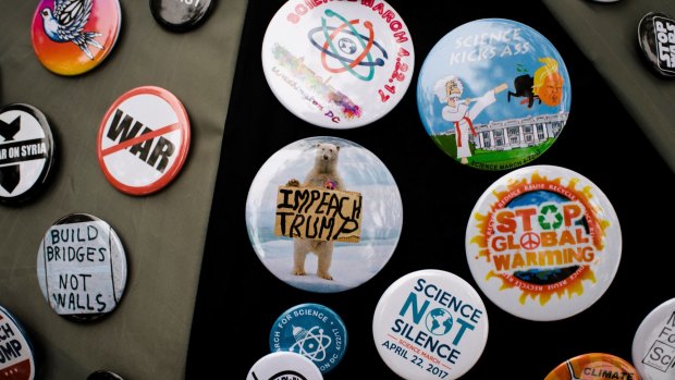 Badges for sale outside of the Washington Monument before the March for Science.