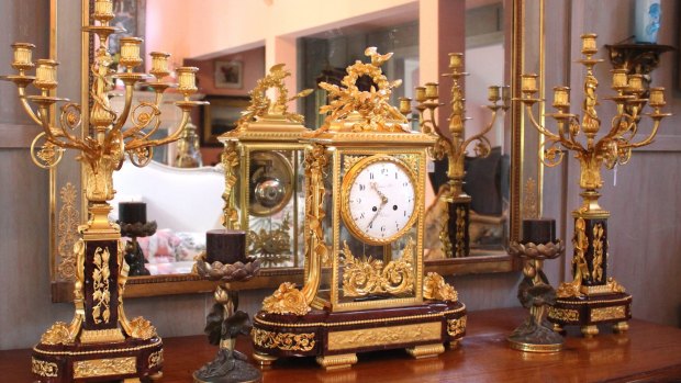 A French three-piece clock garniture by Raingo of Paris. Estimate: $30,000 to $50,000.