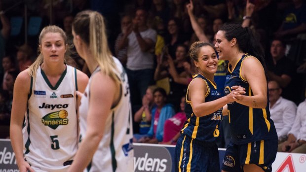 Buzzing: Sydney's Leilani Mitchell and Alex Wilson celebrate their game one win in the grand final series.