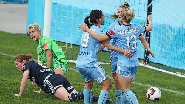 Strike force: Remy Siemsen is congratulated by Leena Khamis and Georgia Yeoman-Dale after scoring Sydney's second goal.