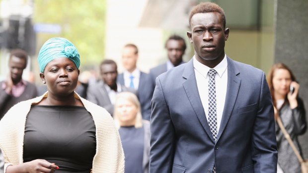 Majak Daw outside the County Court with his sister, Sarah Daw.

