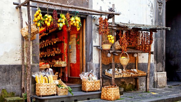 Fresh produce and pasta for sale on a street in Sorrento.