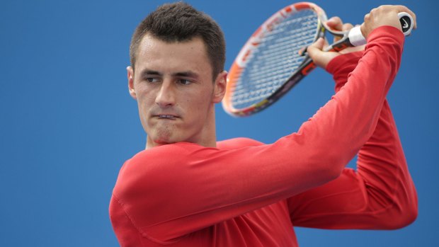 Bernard Tomic works up a sweat during a practice session on Tuesday.