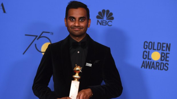 Aziz Ansari with the award for best actor in a television series (musical or comedy) for <i>Master of None</i>.