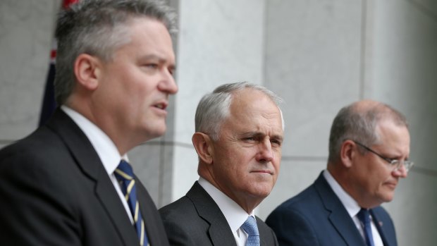 Finance Minister Mathias Cormann, Prime Minister Malcolm Turnbull and Treasurer Scott Morrison. 
