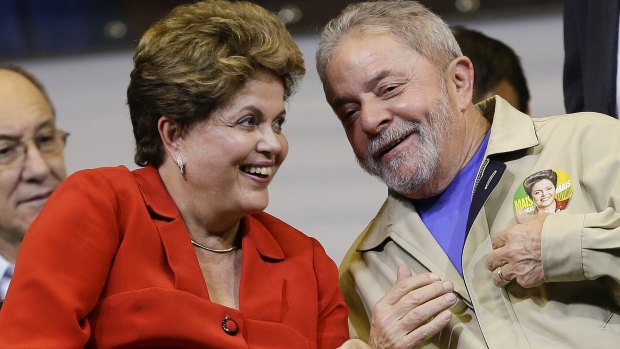 Brazilian President Dilma Rousseff and former Brazilian president Luiz Ignacio Lula da Silva attend an election campaign rally in Sao Paulo last year.