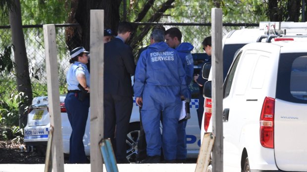 Police at the crime scene in Pine Street, Yennora, in western Sydney. 