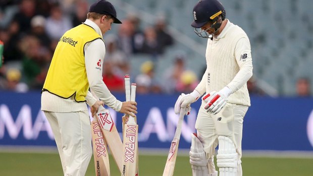 England's Mark Stoneman, right, selects a new bat after damaging his during the second day of their Ashes test match. 