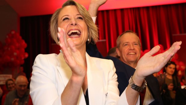 Opposition leader Bill Shorten and Kristina Keneally react after arriving for Labor's Bennelong campaign launch at Ryde on Sunday.