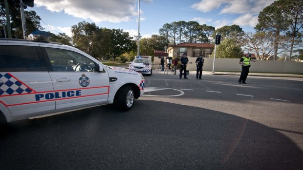 Police block off Samsonvale Road after reports of a gunshot.