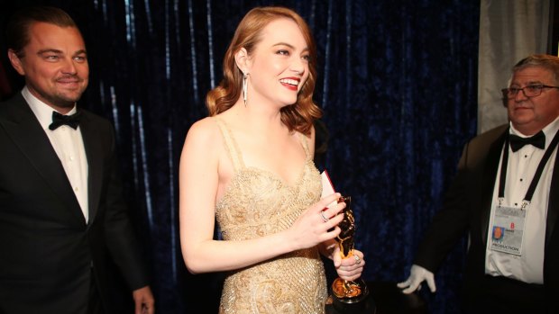 Emma Stone with her Best Actress Oscar for La La Land.