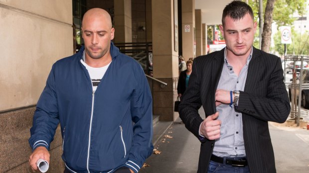 Branimir Lakic (right), charged with the assault of Michael Harris, and his friend Milan Jovic, after giving evidence at Melbourne Magistrates Court. 