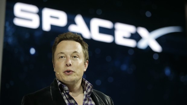 Elon Musk, CEO and CTO of SpaceX, introduces the SpaceX Dragon V2 spaceship at the SpaceX headquarters in Hawthorne, California.