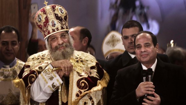 Egypt's President Abdel-Fattah el-Sissi, right, visits Coptic Pope Tawadros II, during Christmas Eve Mass on January 6 this year.