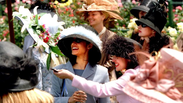 It's looking like the weather will be perfect for Saturday. Here's a photo from Fashions on the Field at Derby Day in 1998.
